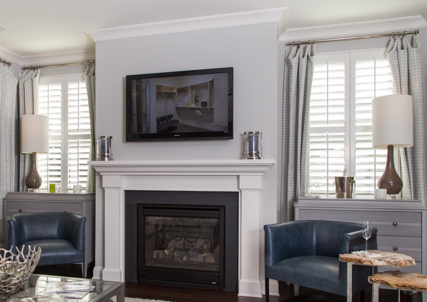 tv room Gainesville faux wood shutters